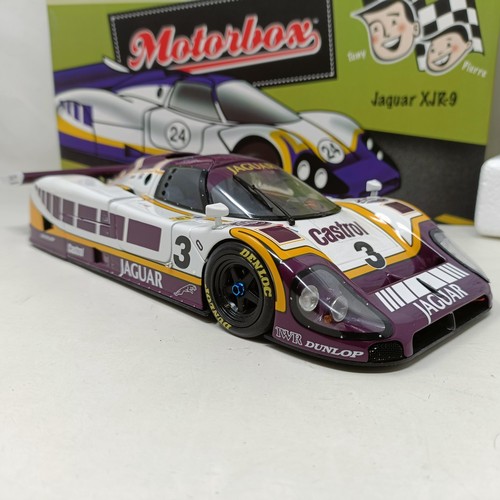 1028 - An Exoto 1:18 scale model, of a Jaguar XJR-9, boxed