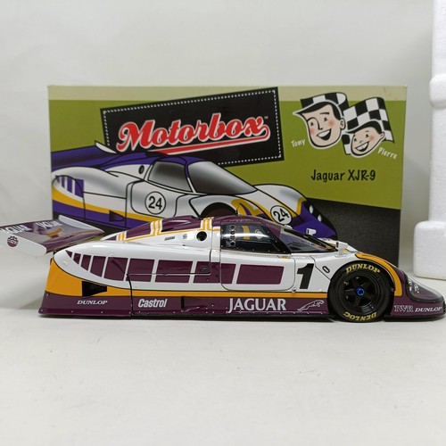 1031 - An Exoto 1:18 scale model, of a Jaguar XJR-9 No 1, boxed