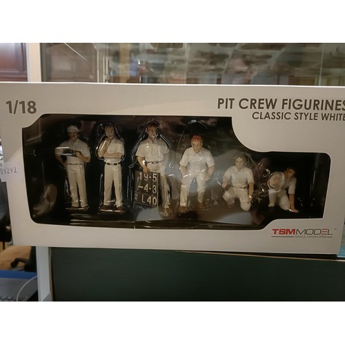 1033 - A TSM 1:18 scale pit crew figure set, boxed, three 1:18 of various Jaguar cars, and a group of empty... 