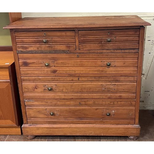 1255 - A pine chest, having two short and three long drawers, 108 cm wide, a pine cupboard, and two pine ch... 