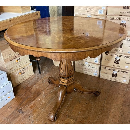 1357 - A Victorian burr walnut tripod table, 90 cm diameter