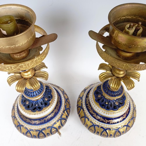 1170 - A pair of French Sevres style candlesticks, with gilt metal mounts, converted to lamps, 34 cm high (... 