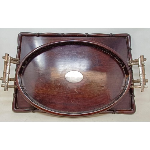 1172 - A Chinese oval hardwood and silver coloured metal mounted tray, inscribed and dated 21/4/34, 54 cm w... 