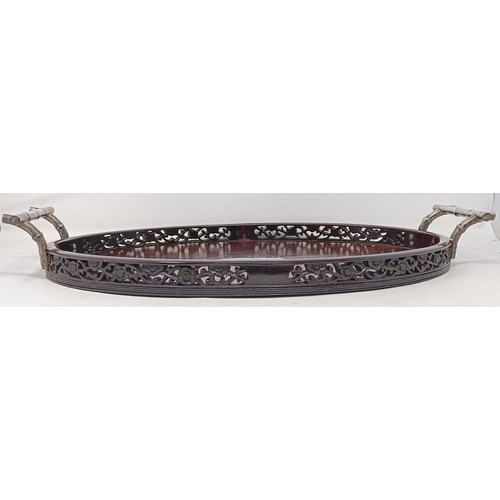 1172 - A Chinese oval hardwood and silver coloured metal mounted tray, inscribed and dated 21/4/34, 54 cm w... 