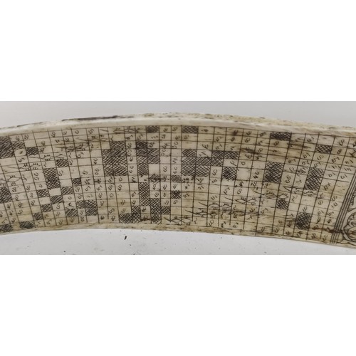 1147 - An Indonesian bone calendar, decorated reptiles, 40.5 cm wide