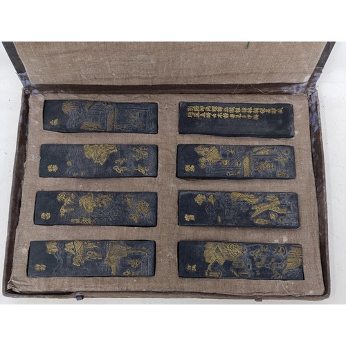 1150 - Eight Chinese ink blocks, cased