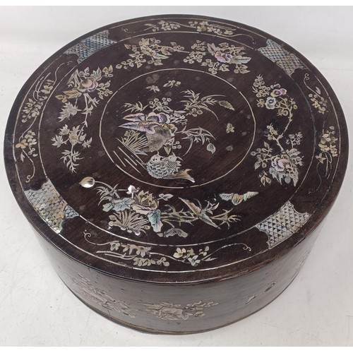 1159 - A Chinese sectional box and cover, with mother of pearl inlaid decoration, slight loss, 28.5 cm diam... 