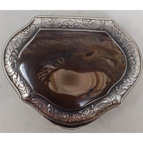 1179 - A George III silver coloured metal snuff box, the lid with engraved decoration and inset an agate pa... 