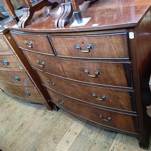 1328 - A mahogany bow front chest, having two short and three long drawers, 110 cm wide