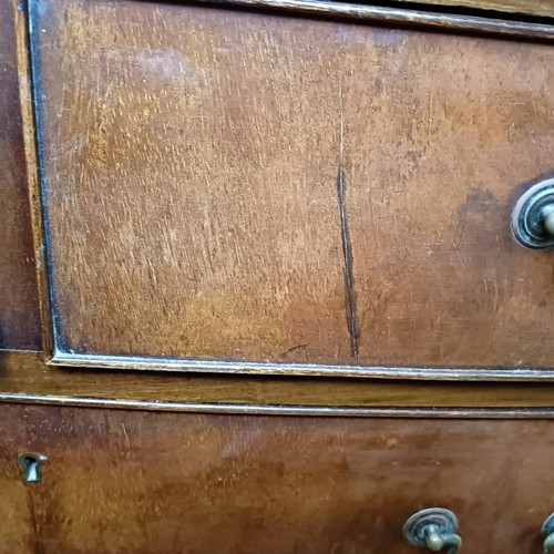 1328 - A mahogany bow front chest, having two short and three long drawers, 110 cm wide