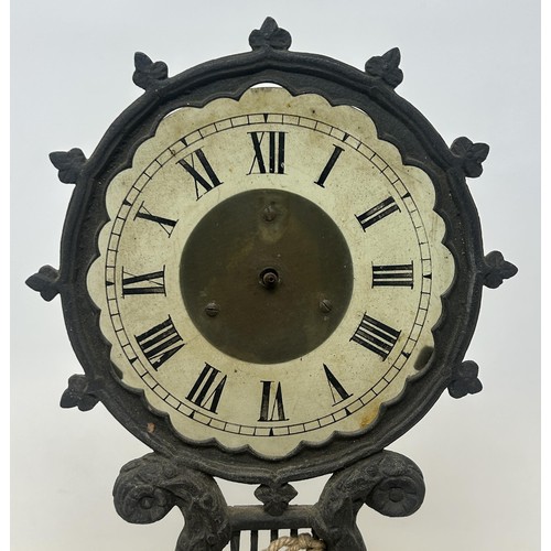 1228 - An unusual late 19th/early 20th century night clock, with a glass dial and a fixture on the back to ... 