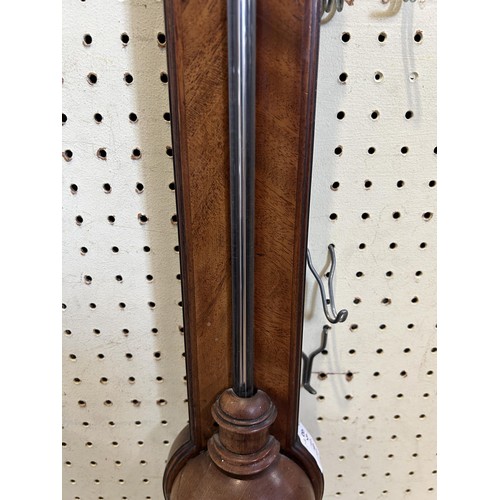 1243 - A George III style mahogany stick barometer, the silvered register signed Wm Scholefield, London, 95... 