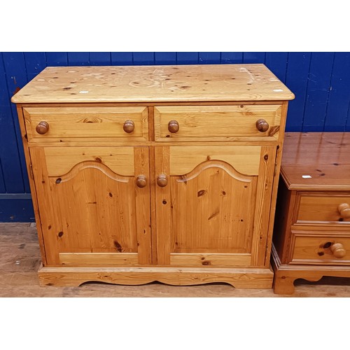 1373 - A pair of pine bedside chests, having three drawers, 40 wide, a set of six pine chairs, a pine cupbo... 