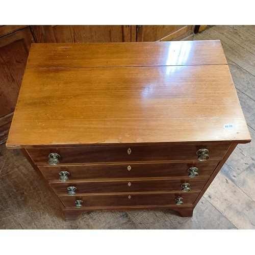 1278 - A mahogany chest of four drawers, adapted from a night commode, 66.5 cm wide