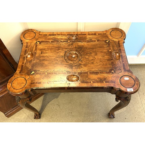 1349 - An 18th century style walnut gaming table, the top with marquetry inlay and yew wood crossbanding, t... 