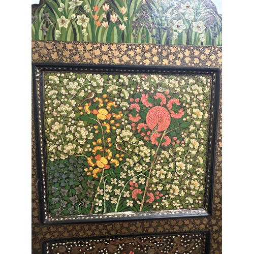 1356 - A Kashmiri style painted three fold screen, decorated flowers, 188 cm high