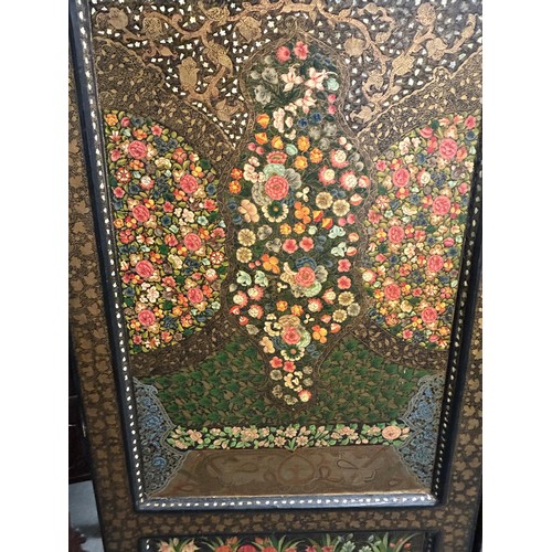 1356 - A Kashmiri style painted three fold screen, decorated flowers, 188 cm high