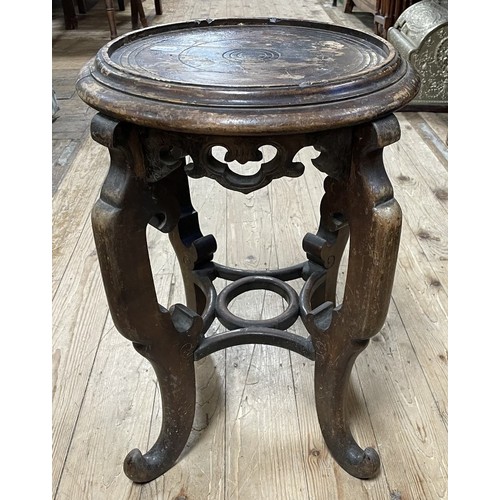 1268 - A Chinese wooden jardinière stand, some loss and repairs, 39 cm diameter