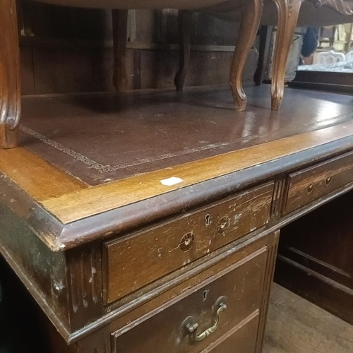 1277 - A George III style mahogany pedestal desk, with a leather inset top, 155 cm wide