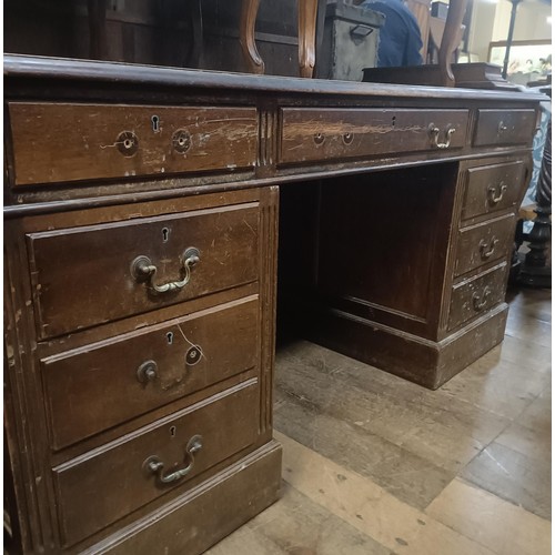 1277 - A George III style mahogany pedestal desk, with a leather inset top, 155 cm wide