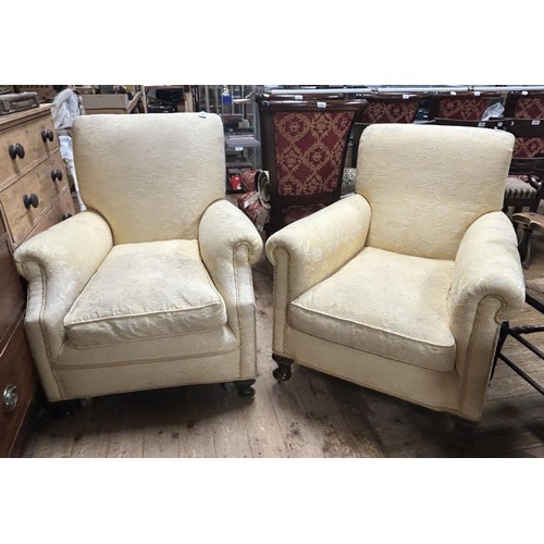 1291 - A pair of Country House style cream upholstered armchairs (2)