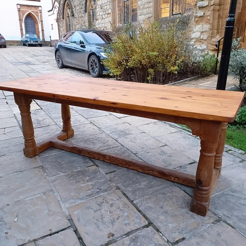 1437A - A pine dining table, 220 cm wide...