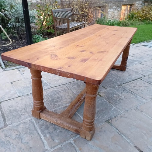 1437A - A pine dining table, 220 cm wide...