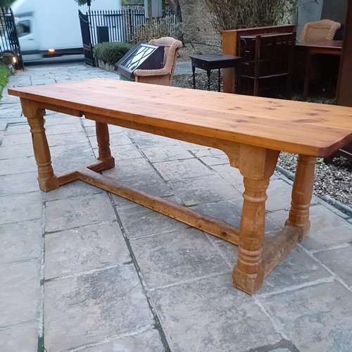 1437A - A pine dining table, 220 cm wide...