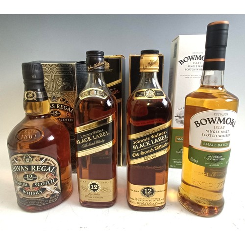 1588 - A 1 litre bottle of Chivas Regal 12 year old blended whisky, boxed, a bottle of Bowmore single malt ... 