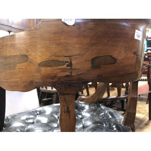 1347 - A 19th century rosewood armchair, with a leather upholstered seat