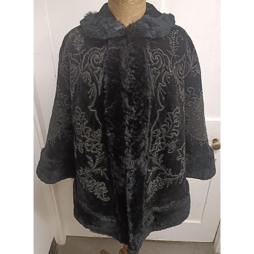 19 - A black velvet and beadwork shawl, with a fur lining Provenance:  A single owner collectio... 