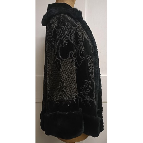 19 - A black velvet and beadwork shawl, with a fur lining Provenance:  A single owner collectio... 