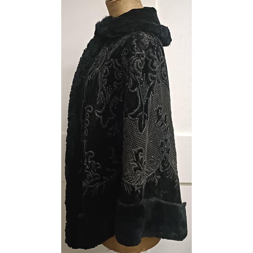 19 - A black velvet and beadwork shawl, with a fur lining Provenance:  A single owner collectio... 