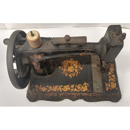 58 - An Atlas B table top sewing machine, 33 cm wide Provenance:  A single owner collection, from th... 