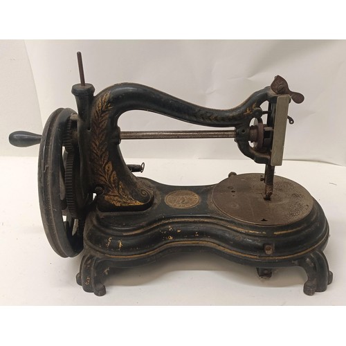 62 - A Jones table top sewing machine, 34 cm wide Provenance:  A single owner collection, from the s... 