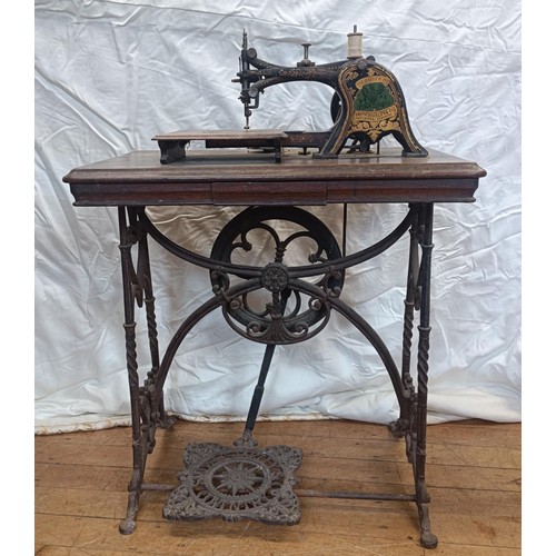 80 - A rare Smith Starley & Co, Coventry, Queen of Hearts sewing machine, on an iron treadle base, 68... 