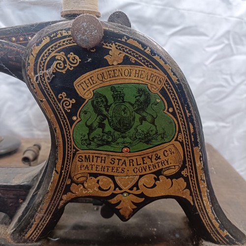 80 - A rare Smith Starley & Co, Coventry, Queen of Hearts sewing machine, on an iron treadle base, 68... 