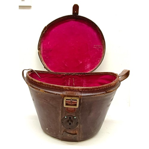 4 - A leather hatbox, an embroidered hat cover, decorated flowers, and assorted hats including a Jean-Ch... 