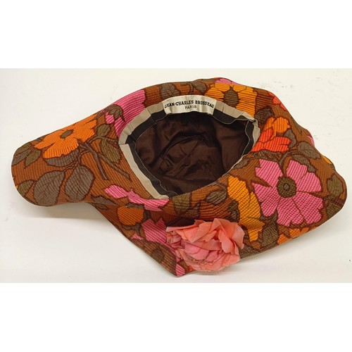 4 - A leather hatbox, an embroidered hat cover, decorated flowers, and assorted hats including a Jean-Ch... 