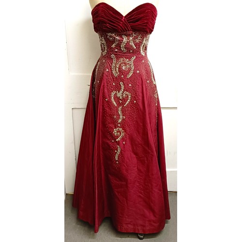 7 - A vintage female mannequin, on a metal tripod base, 170 cm high, and a red evening dressProvenance: ... 