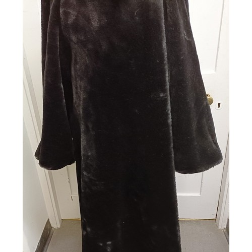 123 - A ladies faux fur full length coat by Wallis, size M/L