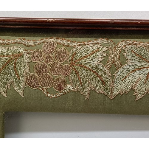 118 - After William Morris, an embroidered frame surround, 45 x 38 cm