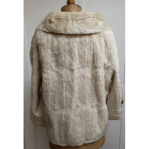 116 - A fur jacket, stole and coat (3)