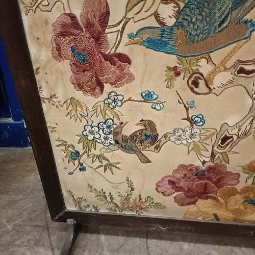 114 - An embroidered firescreen, decorted a parrot, 95 x 77, and another, 106 x 68 cm (2)