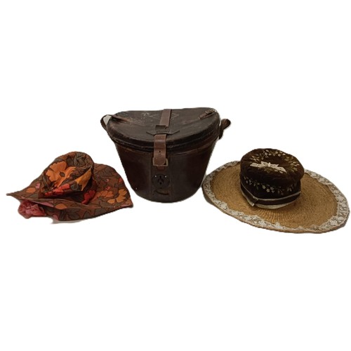 4 - A leather hatbox, an embroidered hat cover, decorated flowers, and assorted hats including a Jean-Ch... 