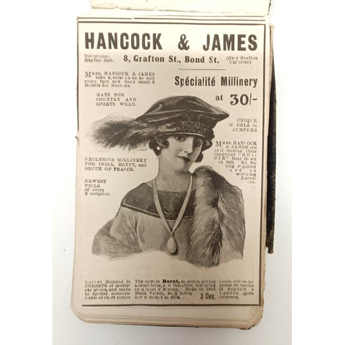 27 - Assorted sewing items, in a display box, and a framed group of early 20th century advertisements (2)... 