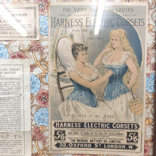 27 - Assorted sewing items, in a display box, and a framed group of early 20th century advertisements (2)... 