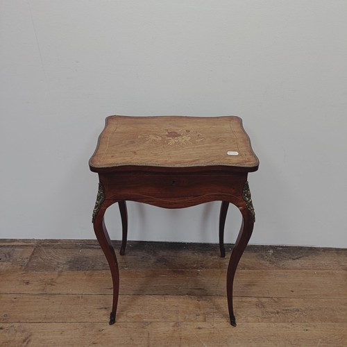 759 - A late 19th/early 20th century French rosewood serpentine work table, with marquetry inlay and gilt ... 