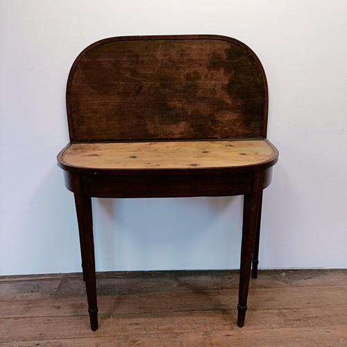 704 - A 19th century mahogany folding card table, 95 cm wide