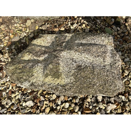 810 - A granite stone, carved with a cross